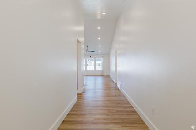 433 North 600 West Smithfield, UT 84335 - Photo 23 of 40 Hallway featuring wood-finish flooring, recessed lighting, and bright white walls