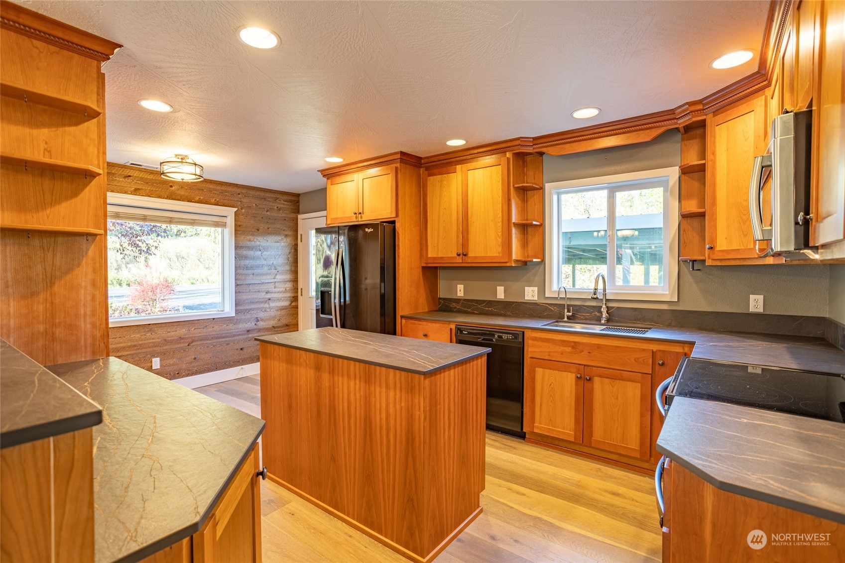 150 Logan Hill Road Chehalis, WA 98532 - Photo 12 of 40 a kitchen with stainless steel appliances granite countertop a sink and a stove