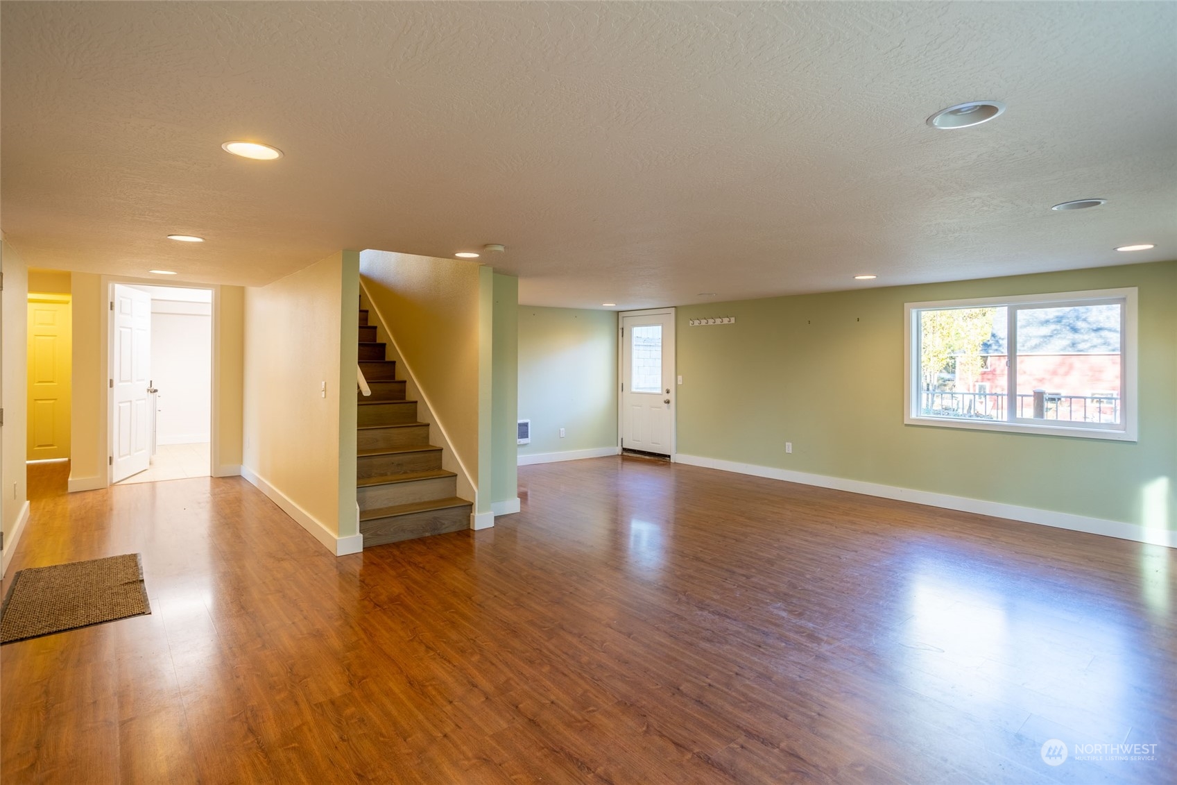 150 Logan Hill Road Chehalis, WA 98532 - Photo 19 of 40 a view of an empty room with wooden floor and a window