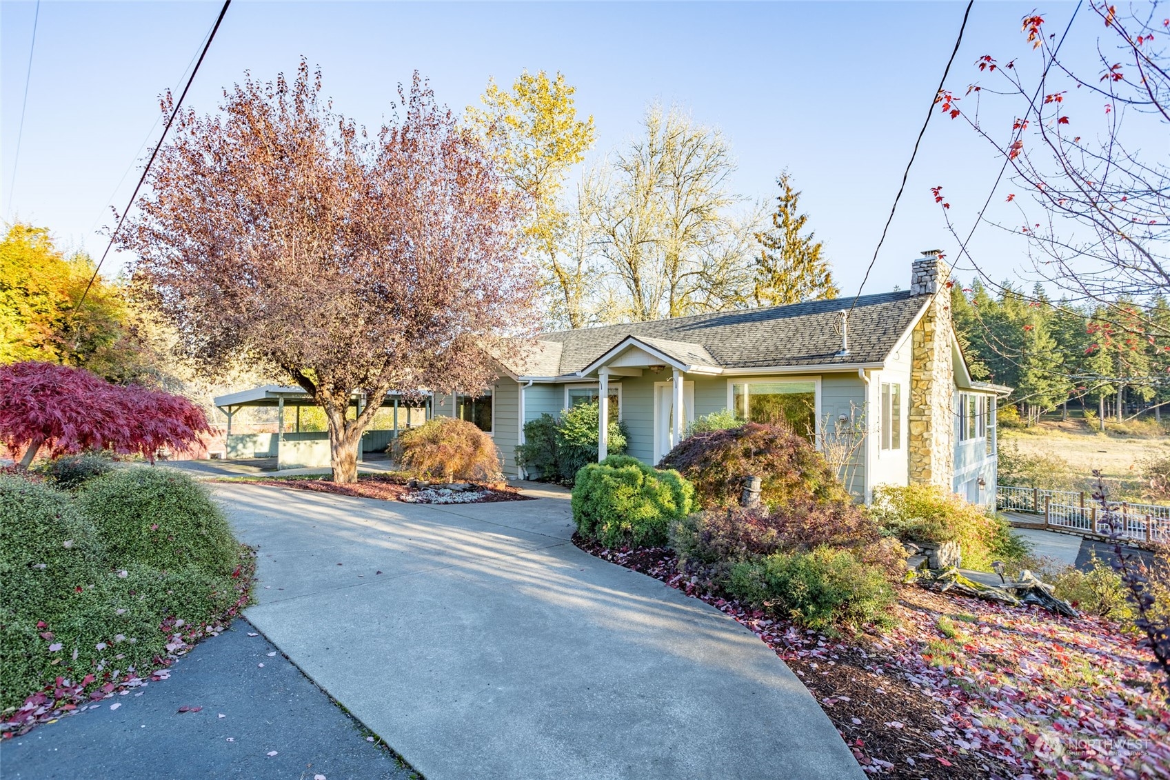 150 Logan Hill Road Chehalis, WA 98532 - Photo 2 of 40 a front view of a house with a yard and outdoor seating
