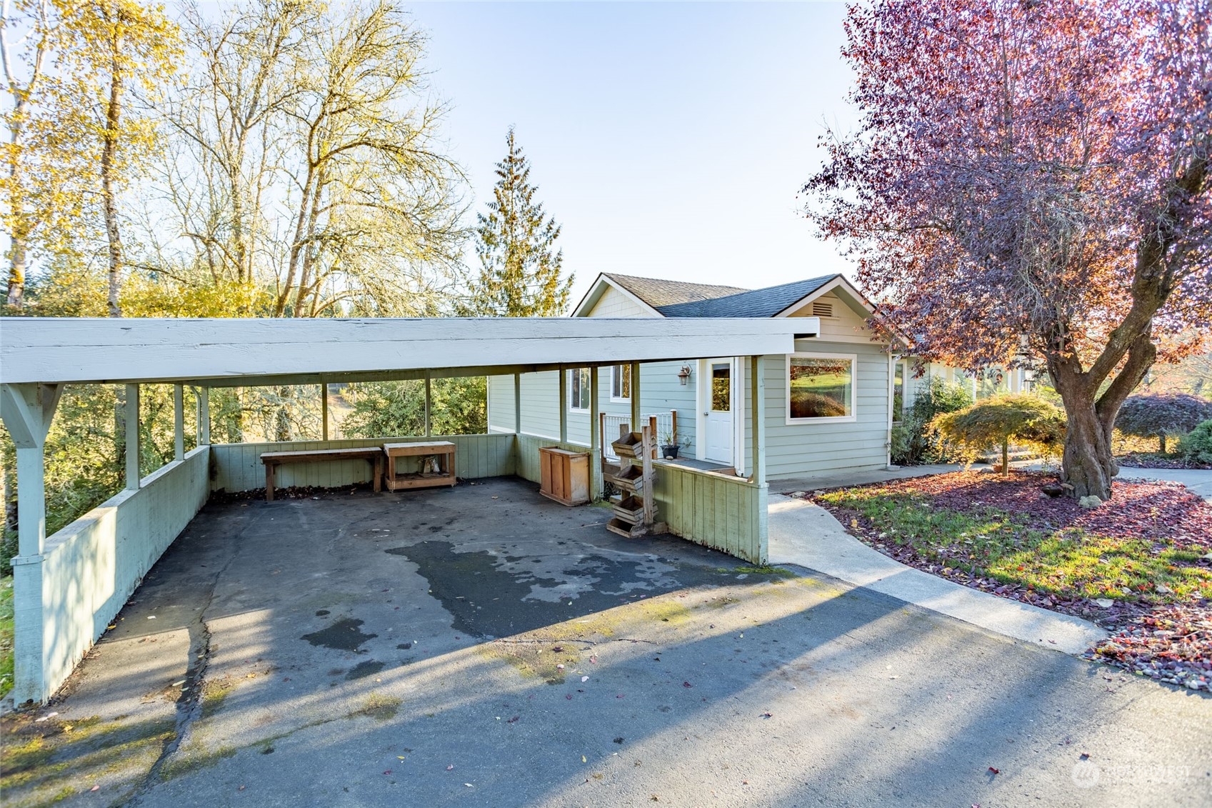 150 Logan Hill Road Chehalis, WA 98532 - Photo 29 of 40 a view of a house with large window and a tree