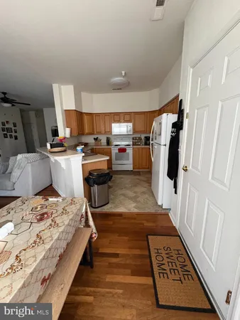 a bed room with a bed furniture and a wooden floor