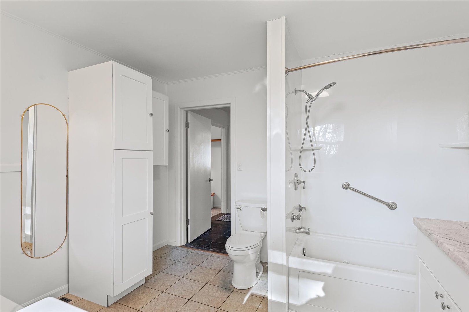 103 West Jefferson Street Philo, IL 61864 - Photo 28 of 36 a bathroom with a granite countertop shower a toilet and sink