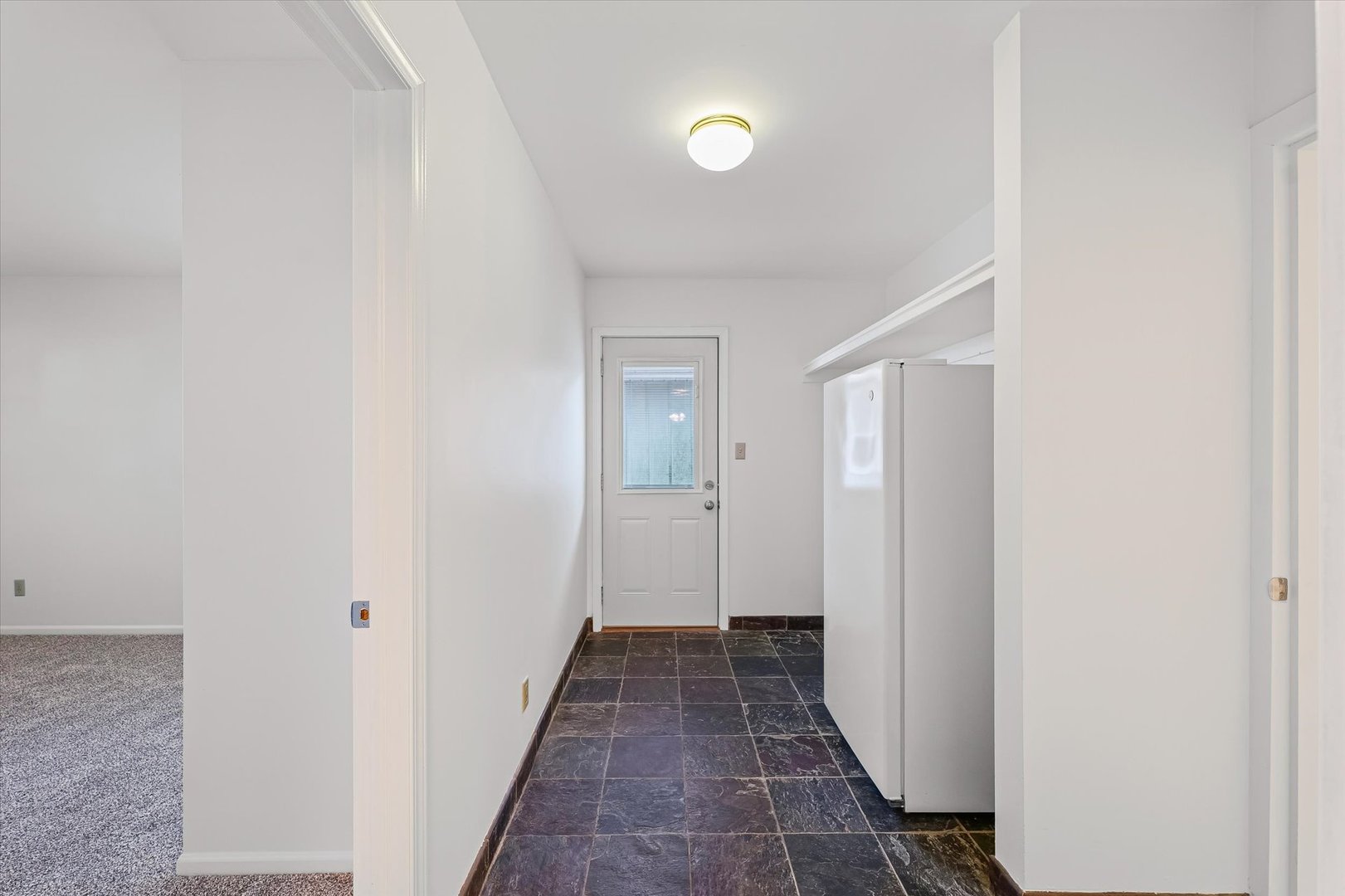 103 West Jefferson Street Philo, IL 61864 - Photo 29 of 36 a view of a hallway with a white walls