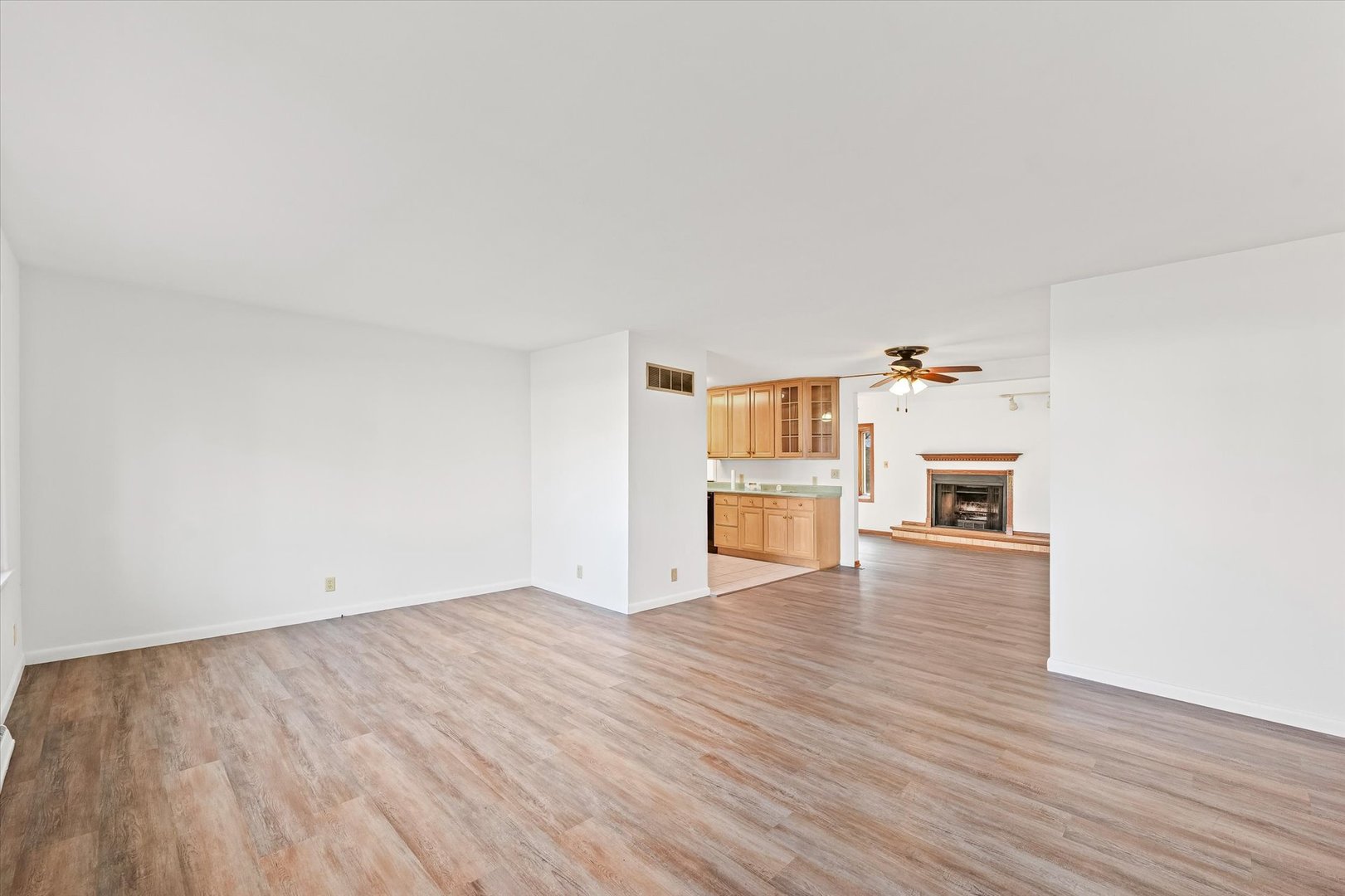 103 West Jefferson Street Philo, IL 61864 - Photo 9 of 36 a view of empty room with wooden floor