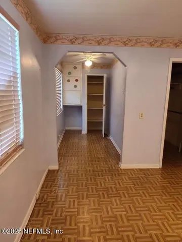 a view of an empty walk in closet