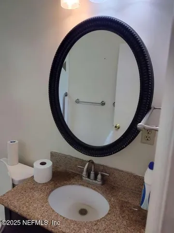 a bathroom with a toilet and a bathtub