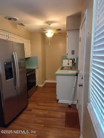 a room with a table and chairs