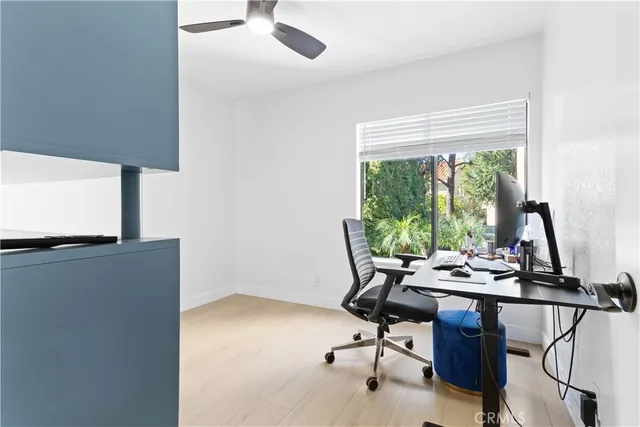 a view of a workspace with furniture and toys