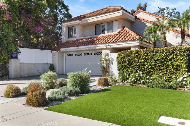 a view of a house with a garden
