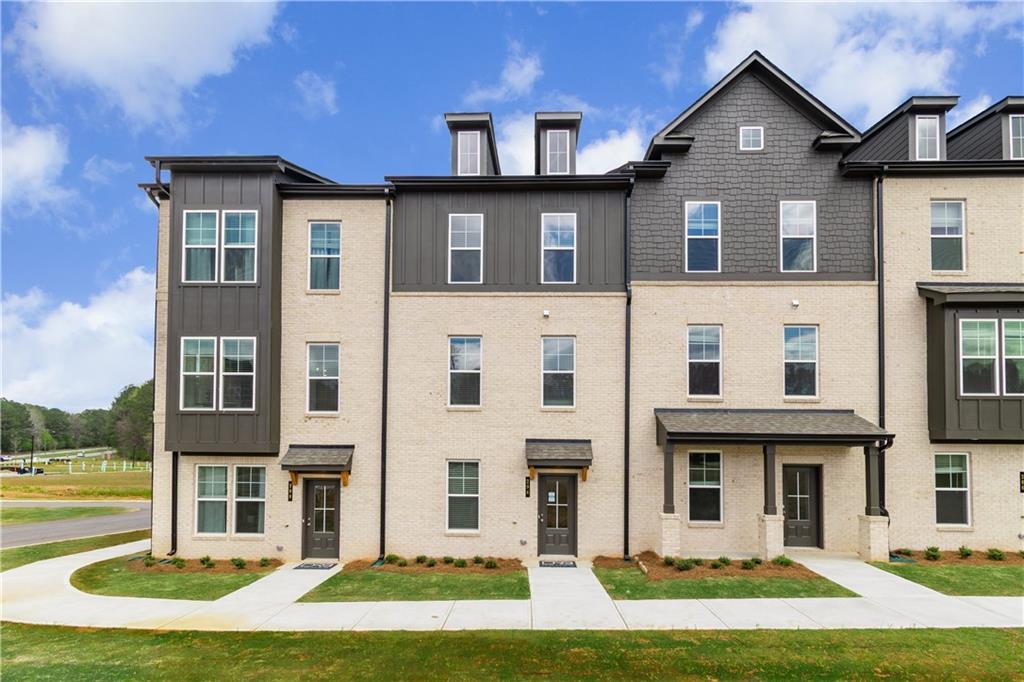 1903 Daybreak Lane Newnan, GA 30265 - Photo 2 of 29 a front view of a house with a yard