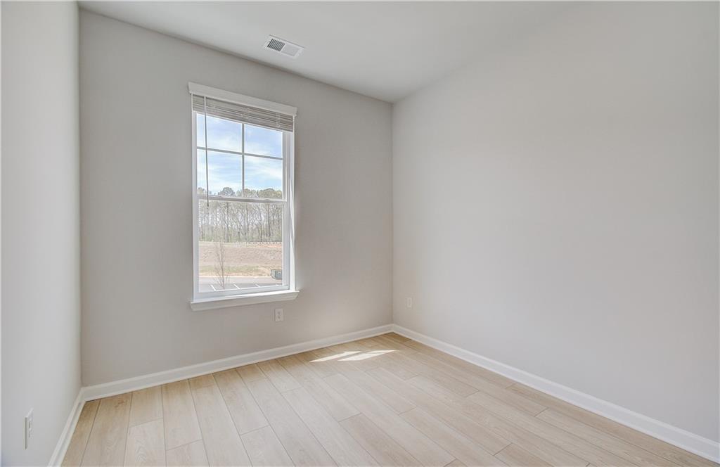 1903 Daybreak Lane Newnan, GA 30265 - Photo 21 of 29 an empty room with a window