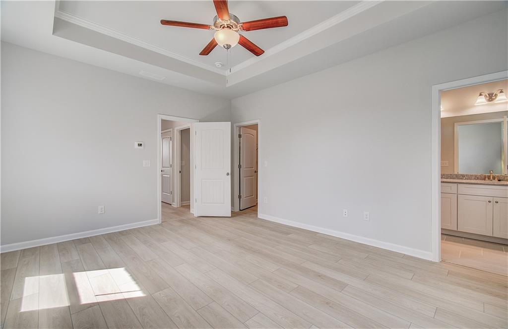 1903 Daybreak Lane Newnan, GA 30265 - Photo 25 of 29 a view of a livingroom with a flat screen tv