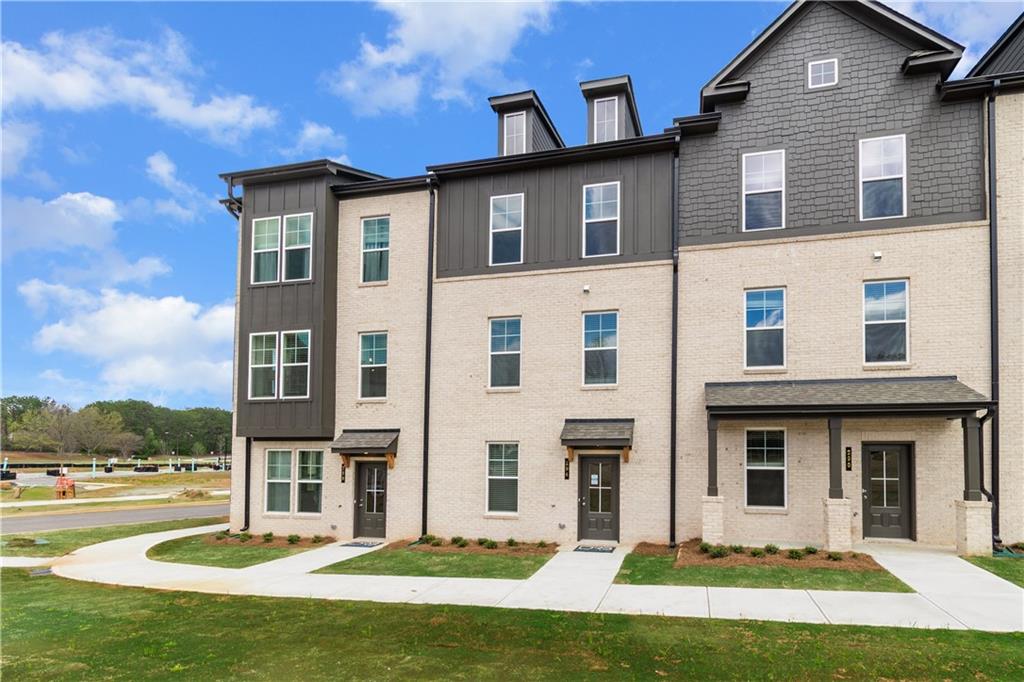 1903 Daybreak Lane Newnan, GA 30265 - Photo 3 of 29 a front view of a house with a yard