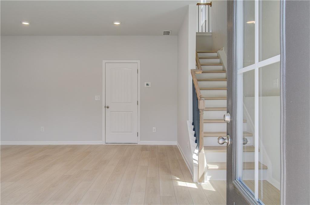 1903 Daybreak Lane Newnan, GA 30265 - Photo 4 of 29 a view of entryway with wooden floor