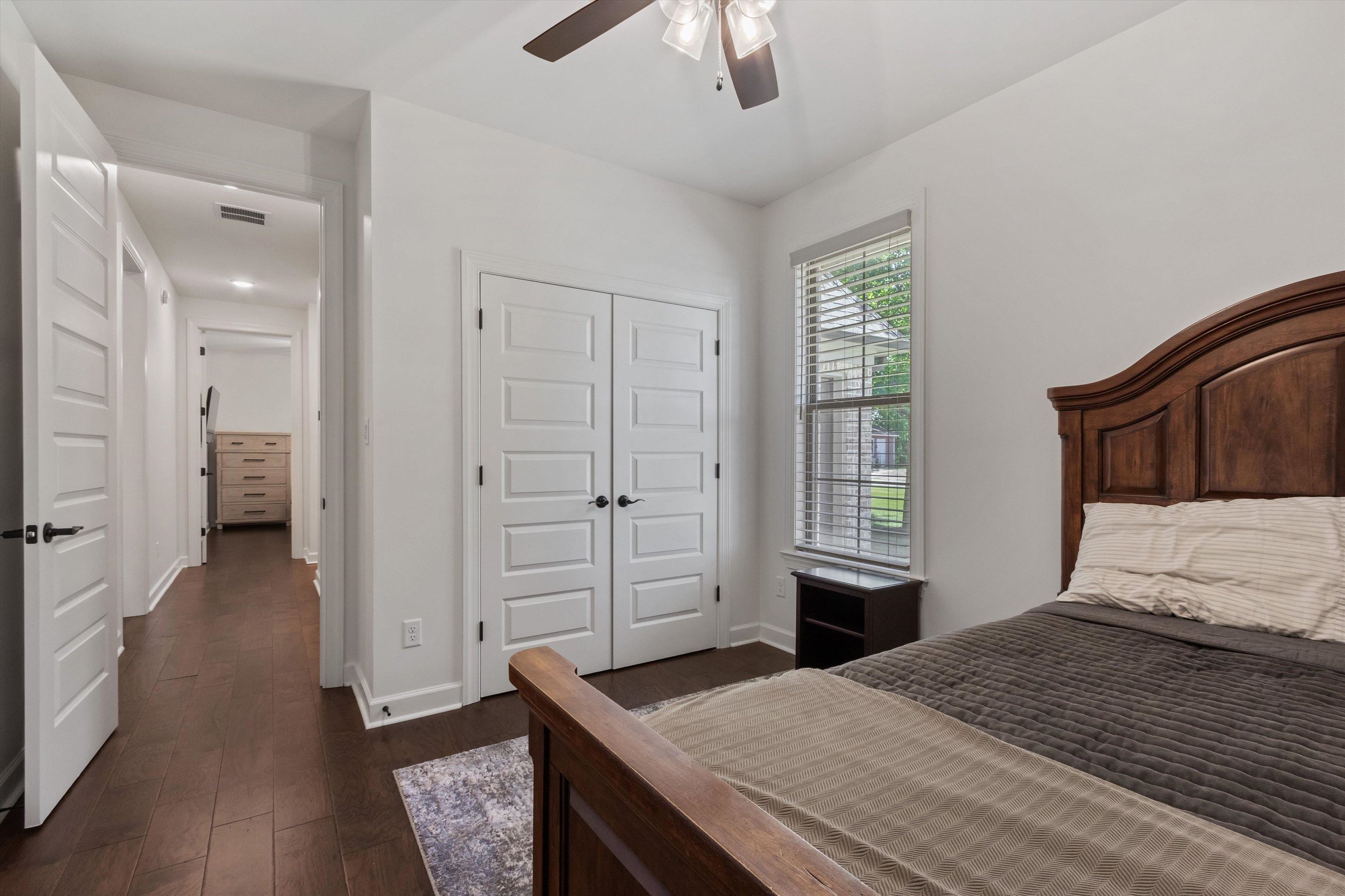 65 Watson Road Oakland, TN 38060 - Photo 25 of 40 a bedroom with a bed and a dresser