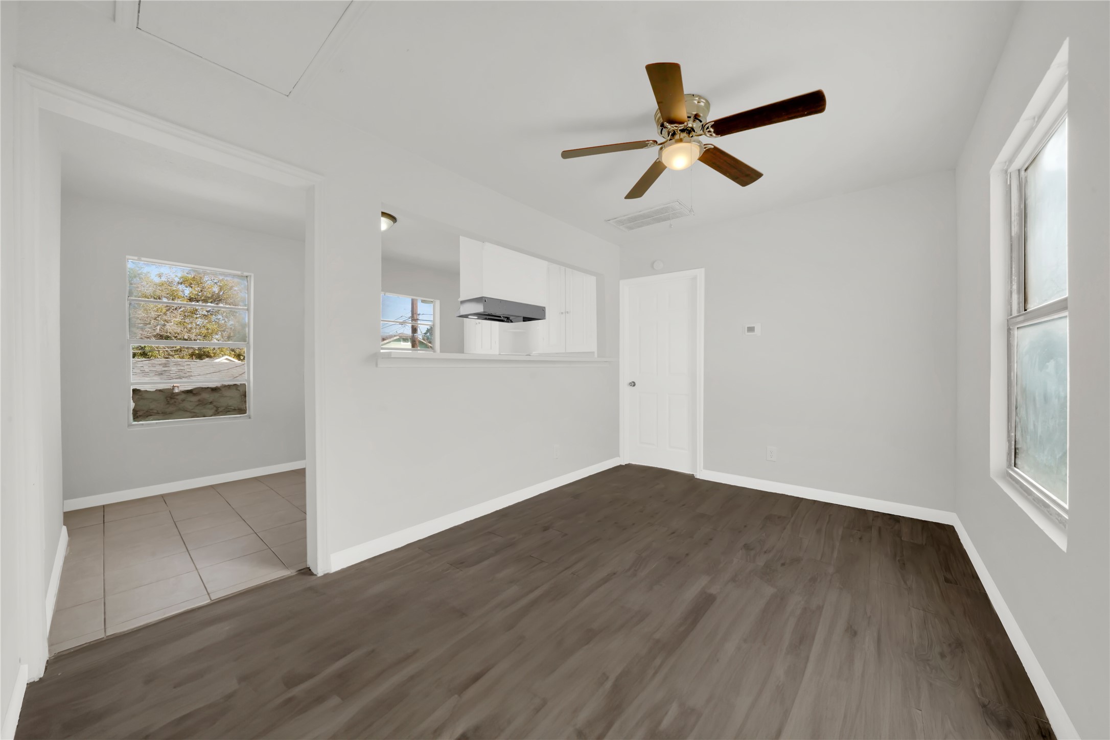 106 Hanover Street Houston, TX 77012 - Photo 37 of 49 wooden floor in an empty room with a window