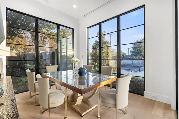 a living room with large windows