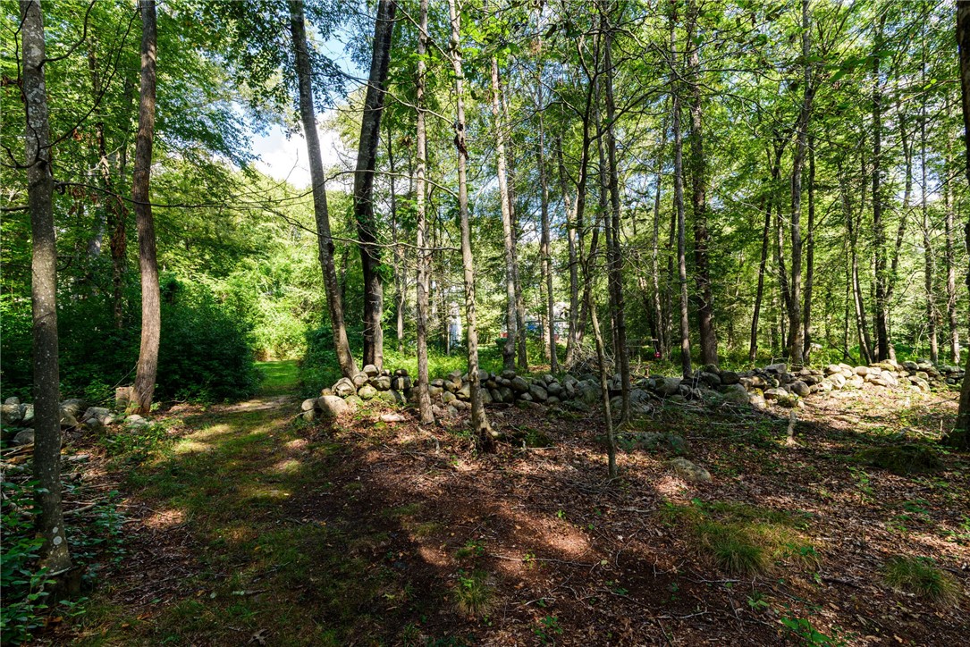 63 Collins Road Hopkinton, RI 02804 - Photo 9 of 50 Wooded trails and natural stone walls