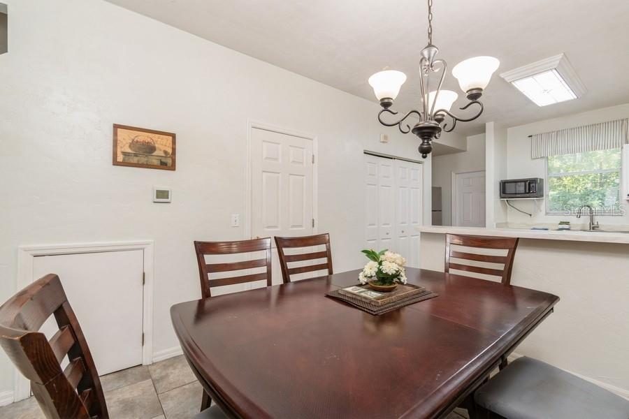 4415 Southwest 34th Street, Unit 204 Gainesville, FL 32608 - Photo 13 of 33 a view of a dining room with furniture
