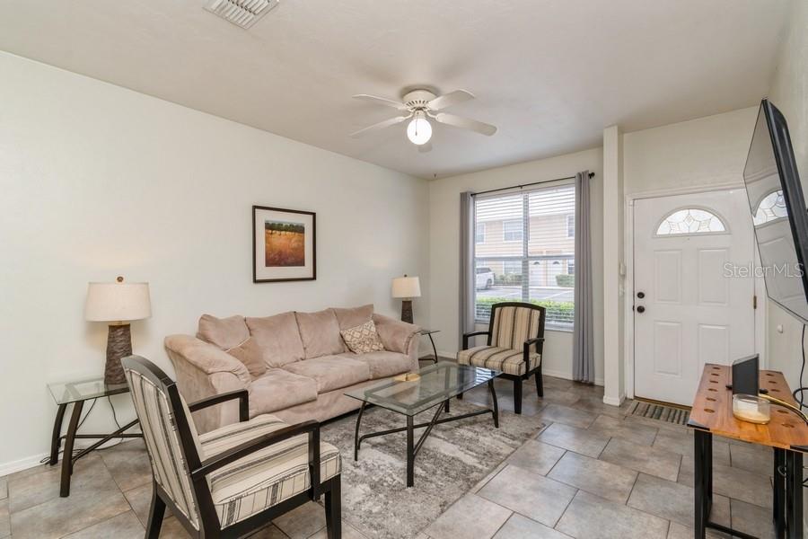 4415 Southwest 34th Street, Unit 204 Gainesville, FL 32608 - Photo 3 of 33 a living room with furniture and a window