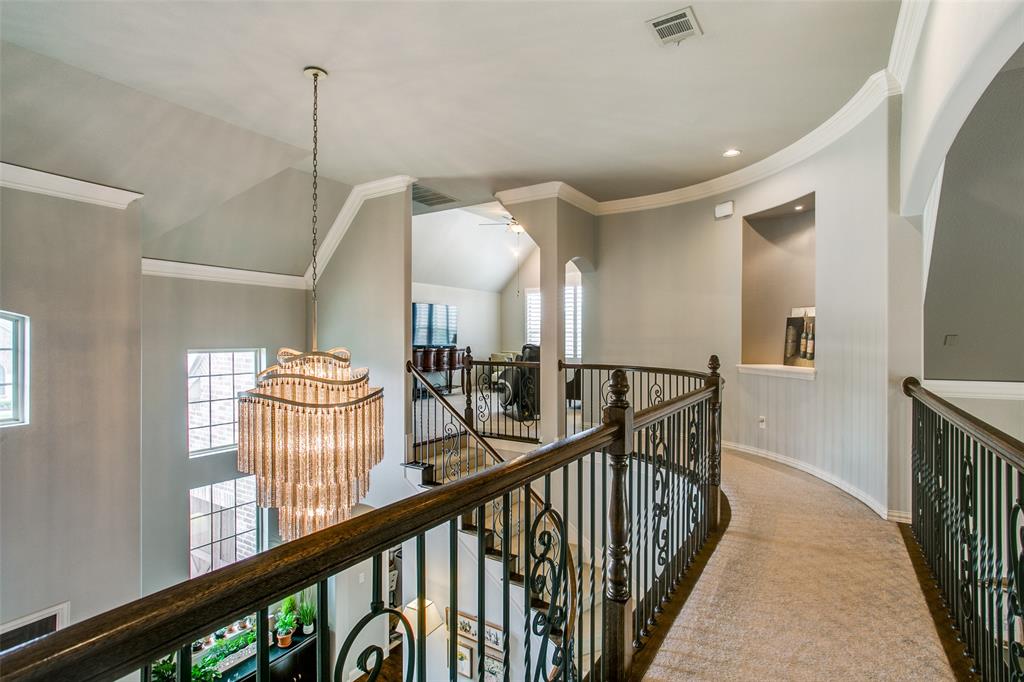 1518 Saddle Tree Road Frisco, TX 75036 - Photo 27 of 40 a view of a hallway view with staircase