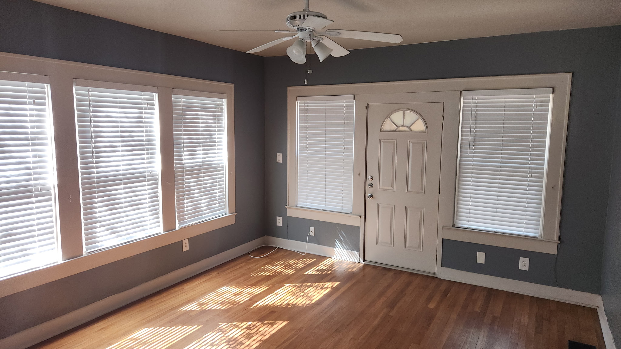 1709 Enfield Road, Unit A Austin, TX 78703 - Photo 3 of 8 Hardwood floors and generous natural illumination create an inviting living space.