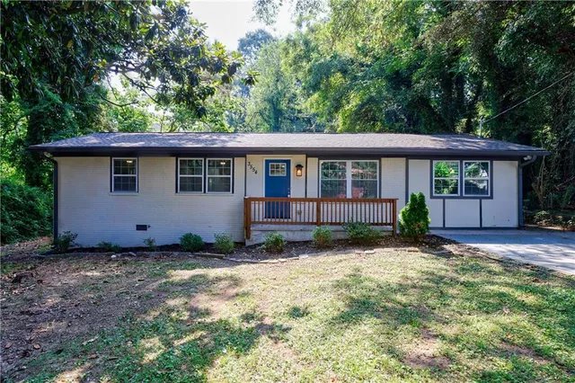 front view of a house with a yard