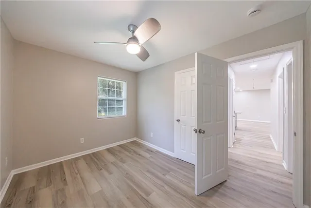 a bathroom with a toilet a sink and bathtub