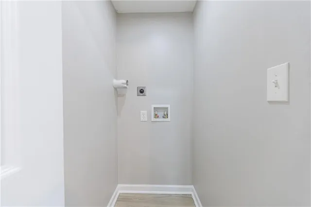 a bathroom with a granite countertop sink a mirror and a shower