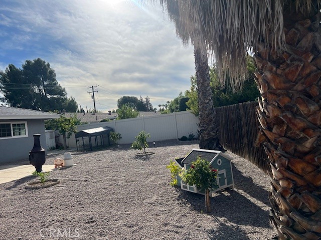 31156 Danelaw Avenue Redlands, CA 92373 - Photo 7 of 8 a backyard of a house with lots of green space