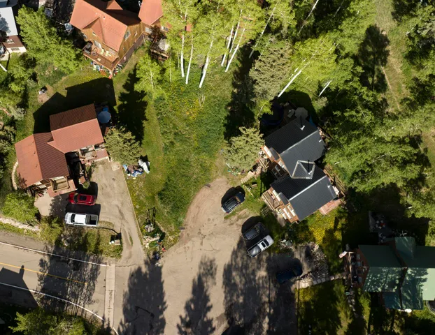 an aerial view of residential house with outdoor space