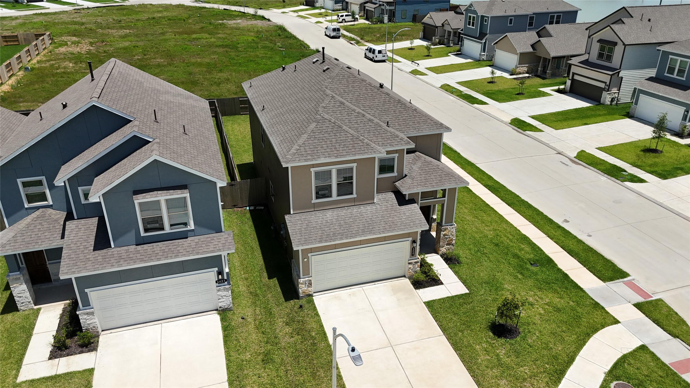 6427 Bolinas Court Rosharon, TX 77583 - Photo 49 of 49 a aerial view of a house with swimming pool lawn chairs and a yard