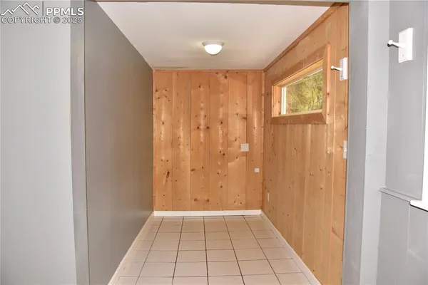 a view of an empty room and window