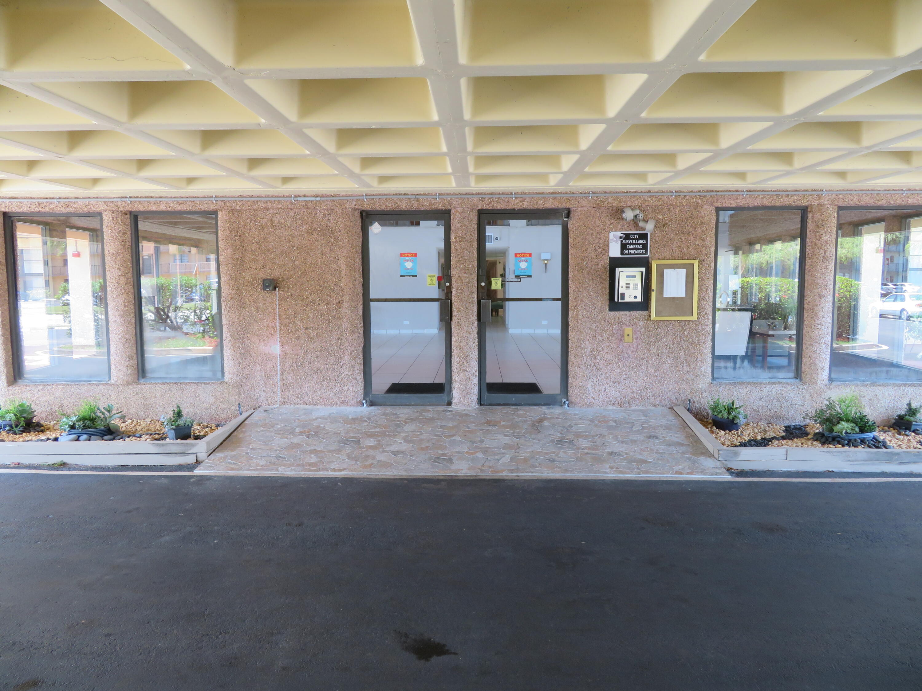 9233 Southwest 8th Street, Unit 409 Boca Raton, FL 33428 - Photo 5 of 40 4.5 9233 Bldg. Entry