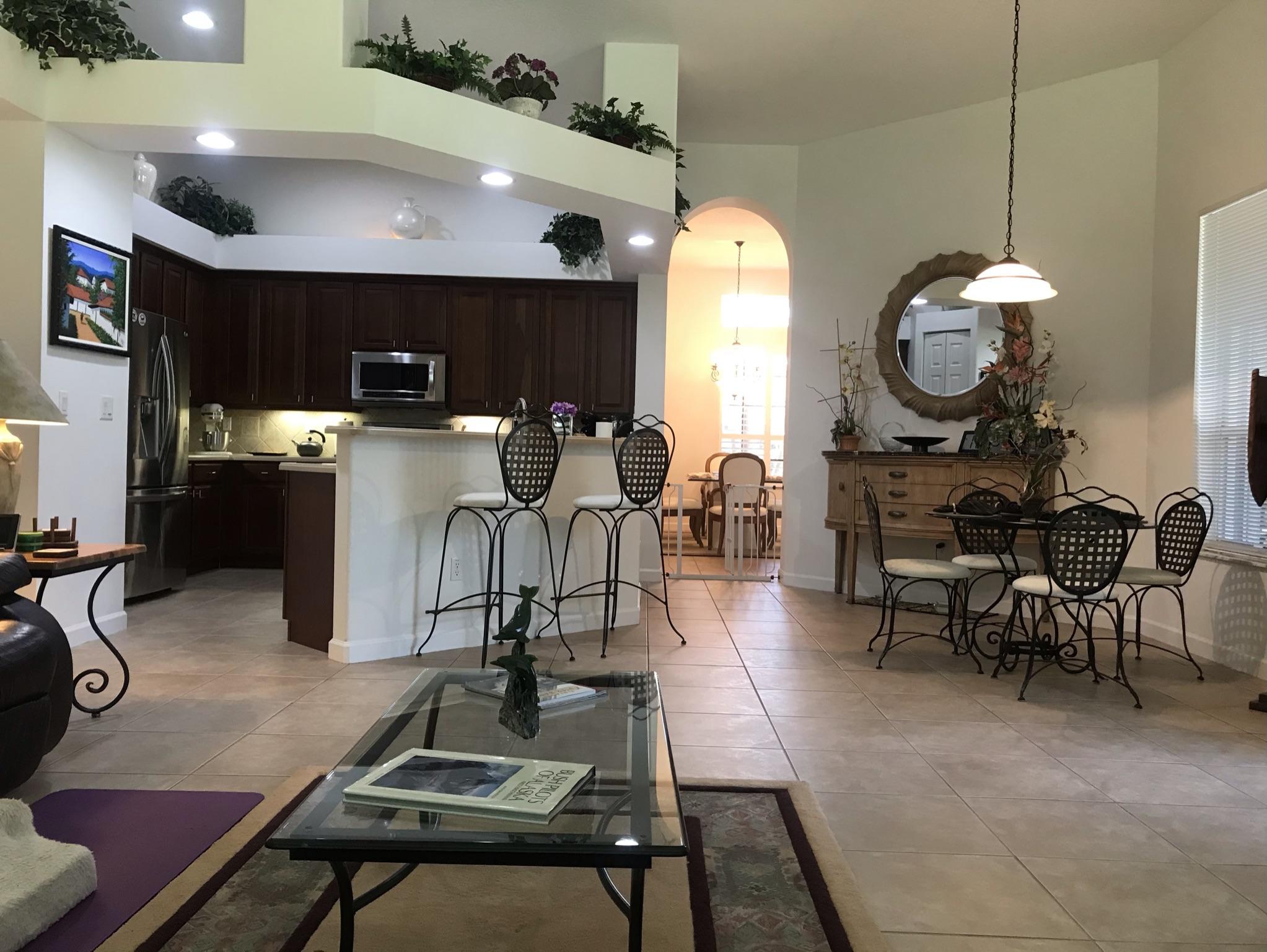 1029 Southwest Blue Stem Way Stuart, FL 34997 - Photo 7 of 17 Family room to kitchen.