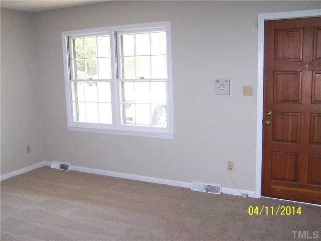 2905 Rannock Court Raleigh, NC 27604 - Photo 2 of 8 an empty room with windows