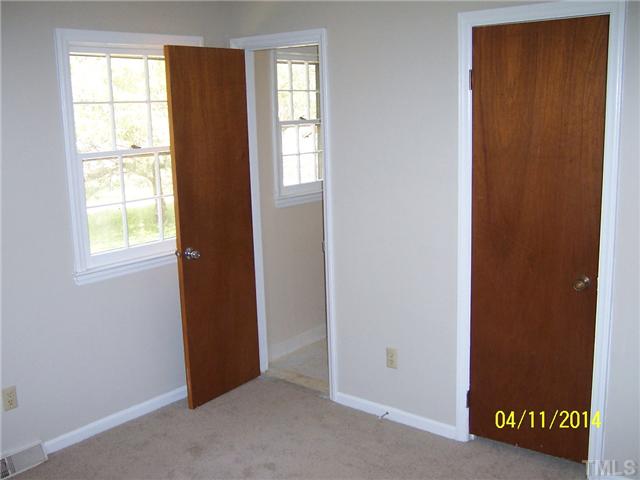 2905 Rannock Court Raleigh, NC 27604 - Photo 7 of 8 an empty room with windows