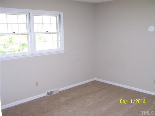 2905 Rannock Court Raleigh, NC 27604 - Photo 8 of 8 an empty room with a window