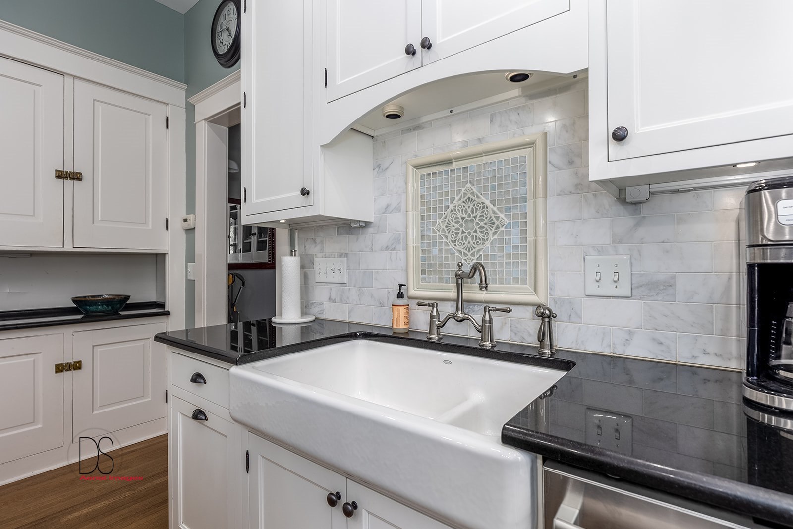 1325 South Main Street Princeton, IL 61356 - Photo 2 of 29 a kitchen with a sink stainless steel appliances and white cabinets