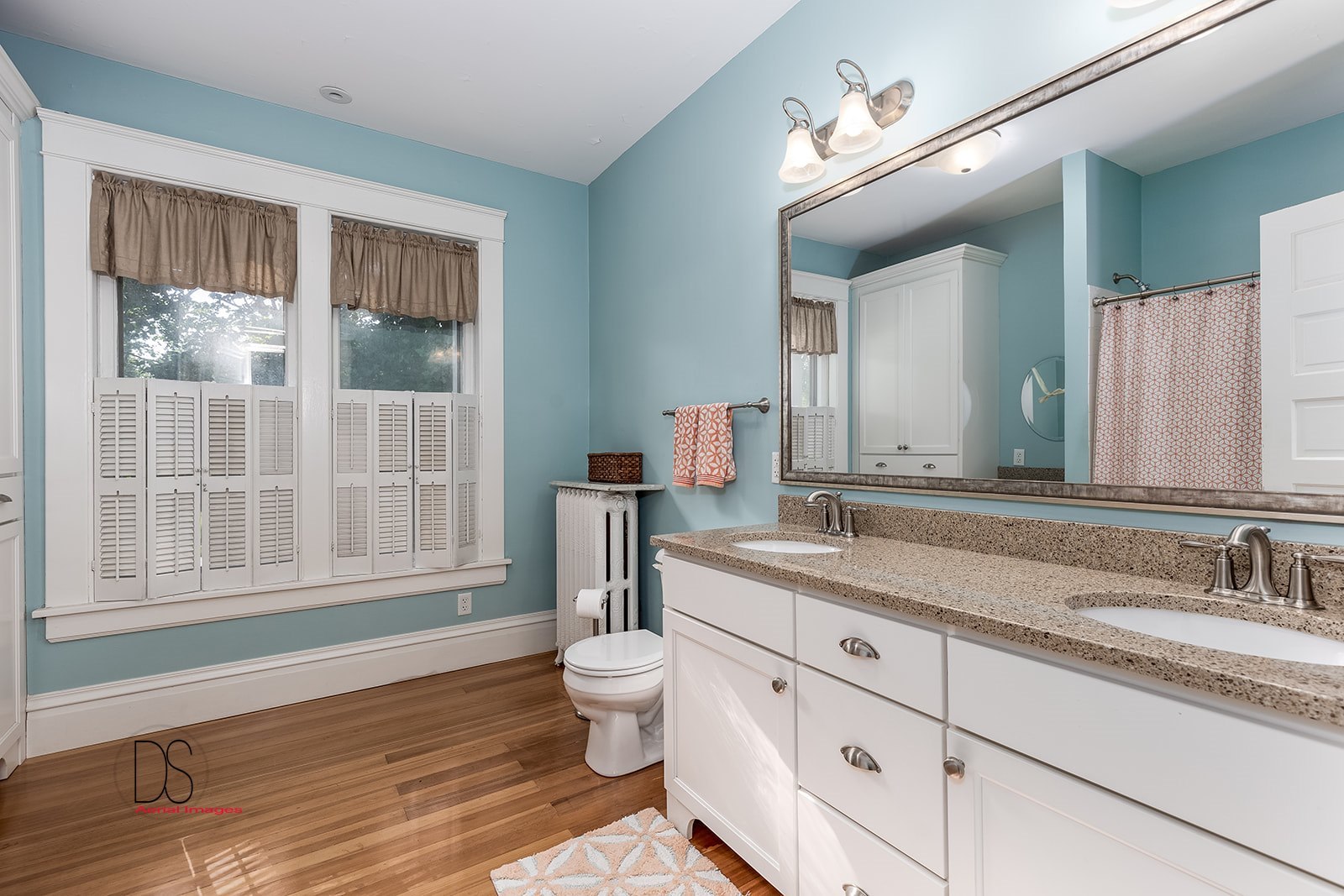 1325 South Main Street Princeton, IL 61356 - Photo 24 of 29 a bathroom with a granite countertop sink mirror and a toilet