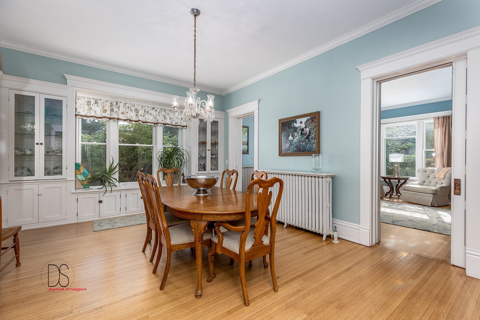1325 South Main Street Princeton, IL 61356 - Photo 4 of 29 a dining room with furniture a chandelier and wooden floor