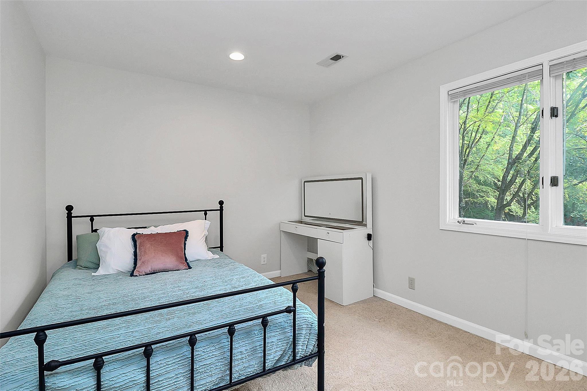 16 Woodvine Lane Clover, SC 29710 - Photo 20 of 48 a bedroom with a bed and window