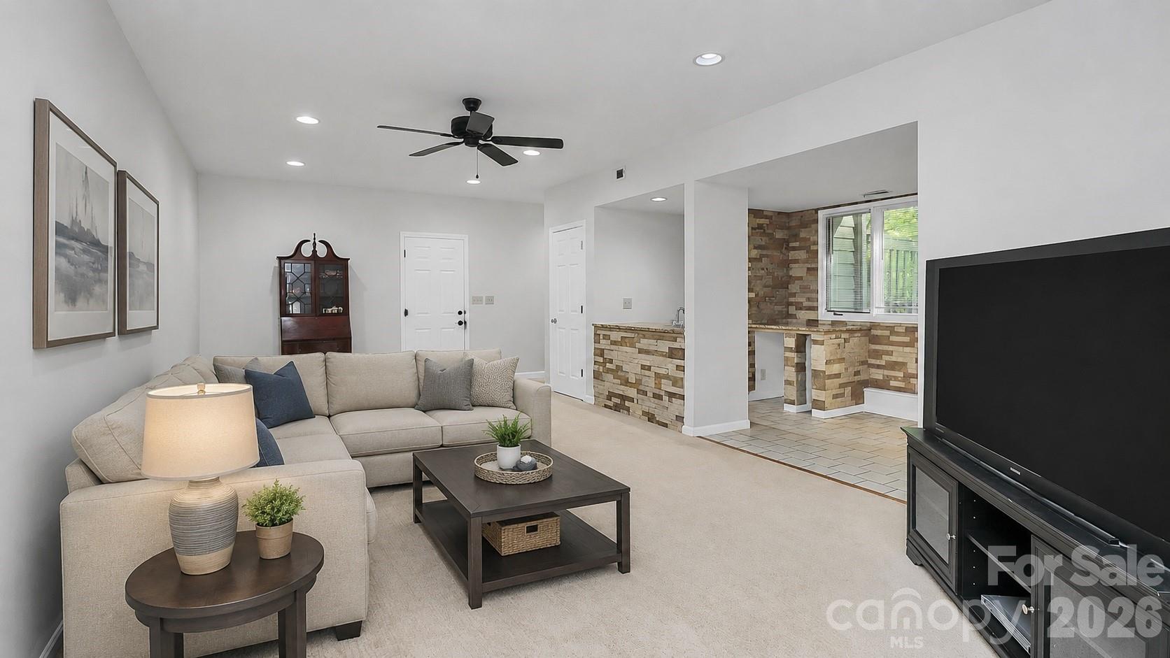 16 Woodvine Lane Clover, SC 29710 - Photo 25 of 48 a living room with furniture and a flat screen tv