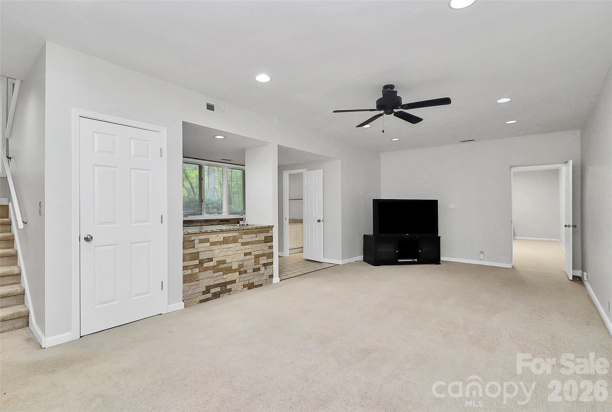 16 Woodvine Lane Clover, SC 29710 - Photo 26 of 48 an empty room with fireplace and a ceiling fan