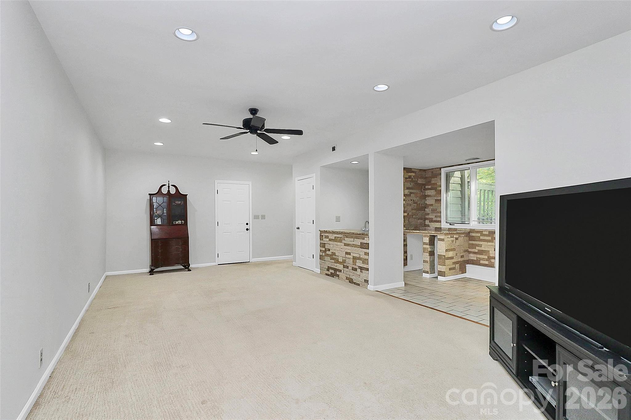 16 Woodvine Lane Clover, SC 29710 - Photo 27 of 48 a view of a livingroom with furniture and a flat screen tv