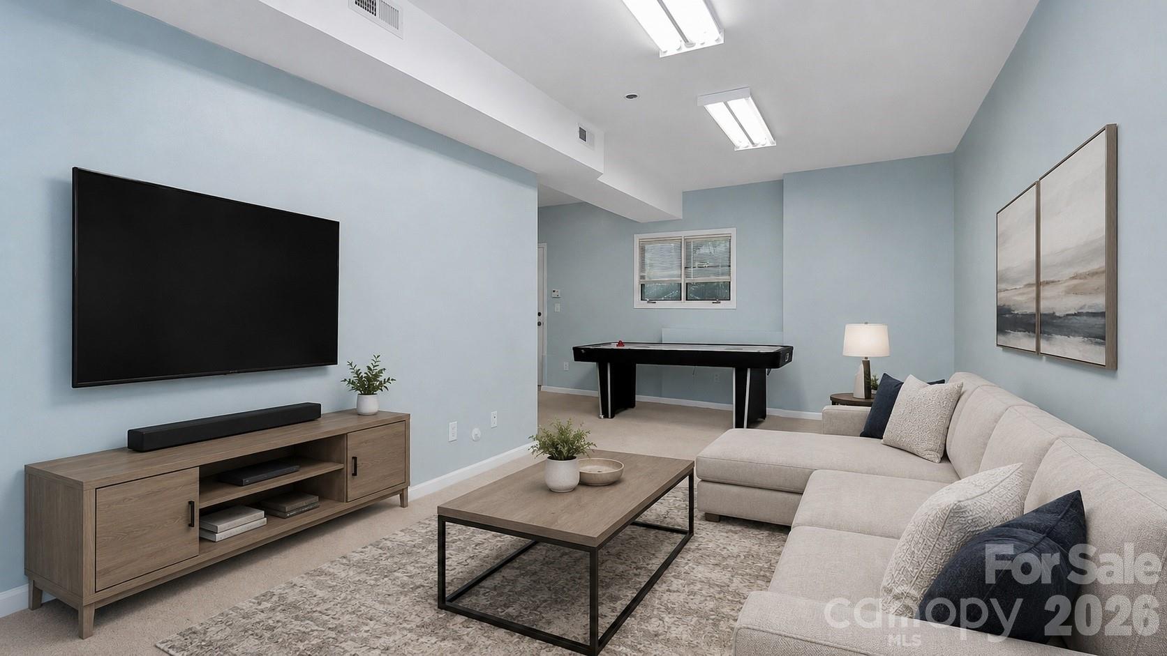 16 Woodvine Lane Clover, SC 29710 - Photo 30 of 48 a living room with furniture and a flat screen tv