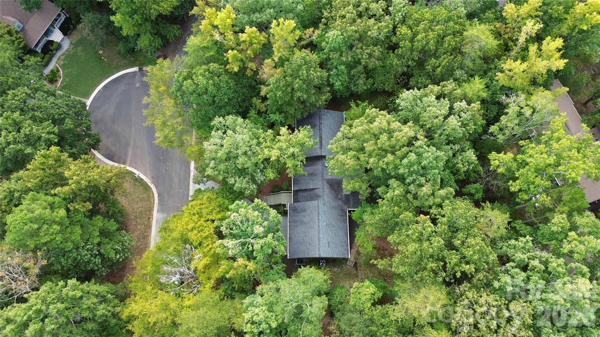 16 Woodvine Lane Clover, SC 29710 - Photo 6 of 48 an aerial view of a house with a yard and garden