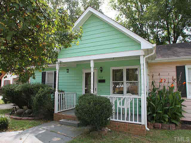 404 Top Greene Lane Raleigh, NC 27601 - Photo 1 of 11 a view of a house with backyard and sitting area