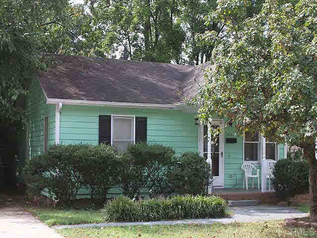 404 Top Greene Lane Raleigh, NC 27601 - Photo 11 of 11 front view of a house with a tree